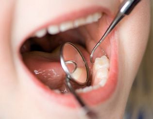 Mouth receives dental exam