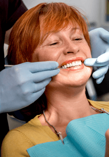 a patient receiving dental care from a dentist near Tyler